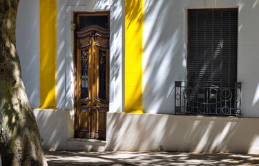 Argentina, Mendoza colorful colonial city streets in historic city center.