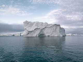 Fototapeta na wymiar Arctic Icebergs in Ilulissat icefjords in Greenland
