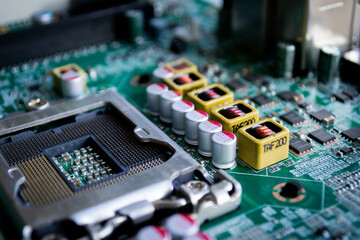 Computer motherboard processor socket with capacitors and coils