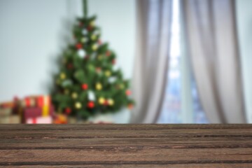 Wooden empty table and Christmas tree background