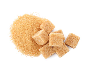 Granulated and cubed brown sugar on white background, top view