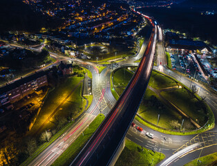 Fototapeta na wymiar Night over Penn Inn Flyover and Roundabout from a drone Newton Abbot, Devon, England