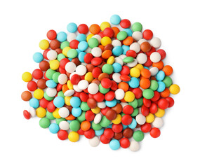 Many small colorful candies on white background, top view