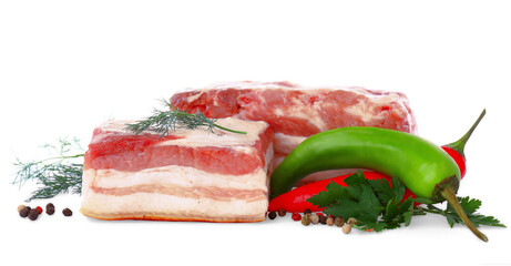 Pieces of pork fatback and different spices on white background