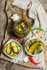 Pickled cucumbers for winter organic food. Jar of homemade gherkins, clean eating, vegan concept