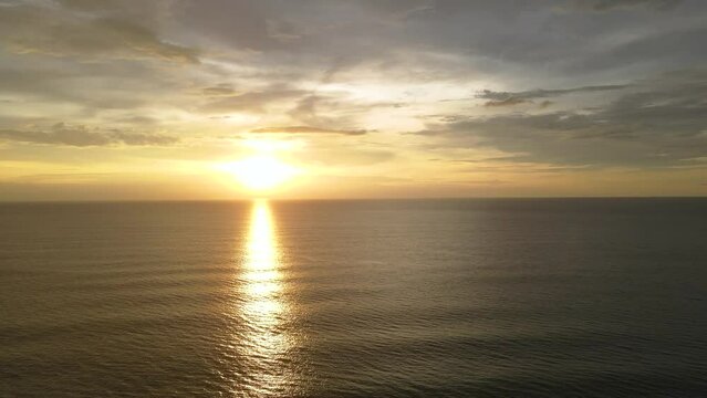 texture sunlight of sunset on sea water in sky reflection.