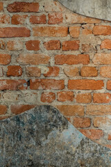 Rustic stone wall texture. Exposed red brick heritage wall background.