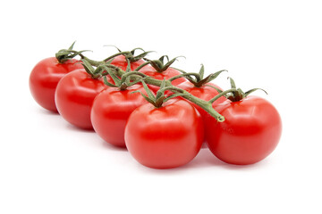 Fresh cherry tomato twig isolated on white