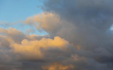 Naklejka na ściany i meble Beautiful layer of clouds on sunset sky.