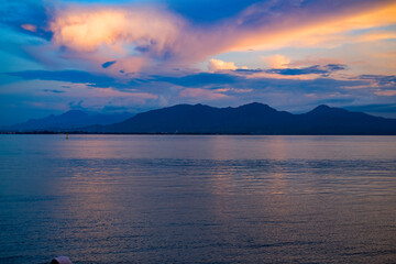 sunset on Dermaga Cinta Beach, Banyuwangi. Sunset with view of Bali Island. Sunset over the sea.