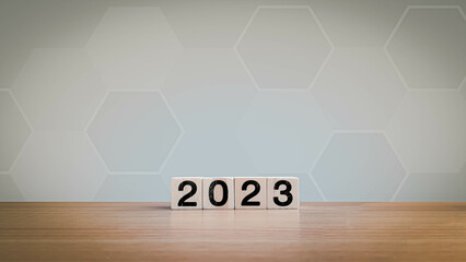 2023 Happy New year background banner. Two thousand Twenty-Three year numbers on wooden cube blocks...