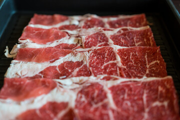 Premium quality sliced beef meat with perfect marbled textured for Sukiyaki and Shabu. Premium rare beef
