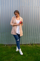 young beautiful woman in a jacket and jeans