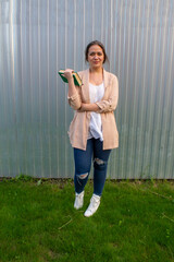 young beautiful woman in a jacket and jeans