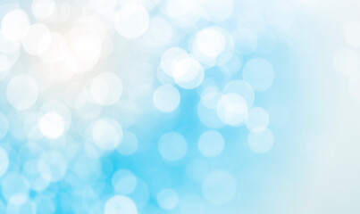 Obraz premium Beautiful Shiny White Bokeh Lights Abstract Background. Bokeh Magic Glitter Lights on Blue Background. Defocus, Blurred Celebration Festive Chrismas Backdrop. 