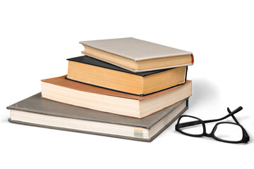 Collection stack of old retro books and glasses