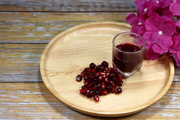 Pile of fresh and organic Pomegranate, mock up of the high vitamin fruit juice concept. 