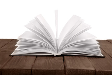 Open book on wooden desk. Education concept
