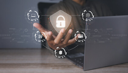 Businessman secure access protecting personal data with virtual screen interfaces.