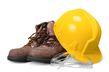 Yellow construction helmet and worker shoes