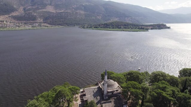 Aerial Flying Over The Aslan Pasha Mosque Towards Ioannina Lake. Establishing Shot
