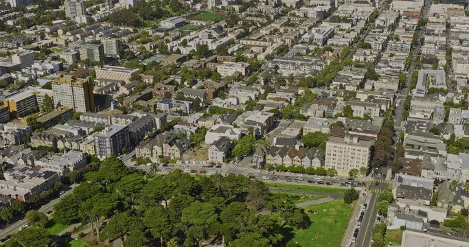San Francisco California Aerial v170 birds eye view flyover alamo square capturing painted ladies victorian houses in the neighborhood, tilt up reveals cityscape - Shot with Mavic 3 Cine - June 2022