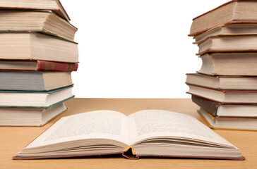 Open book on wooden desk. Education concept
