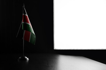 Small national flag of the Kenya on a black background