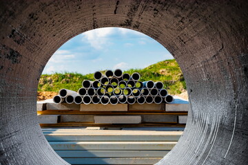 Building materials at a construction site. Prepared materials and embedded parts for foundations at...