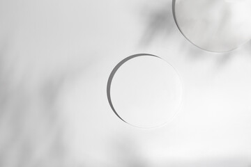 Mockup of white round podiums with shadow. Minimal cosmetic background for product presentation. Top view.