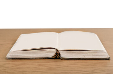 Open book on wooden desk. Education concept