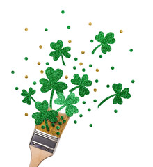 Creative St. Patricks Day concept made with paint brush and green glitter shamrocks on transparent...