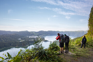 Group of hikers enjoying the scenic views of São Miguel island in the Azores