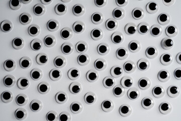 arrangement of googly eyes isolated on a white background