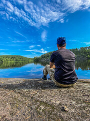man sitting on the rocks