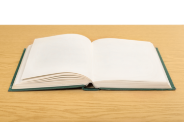 Open book on wooden desk. Education concept