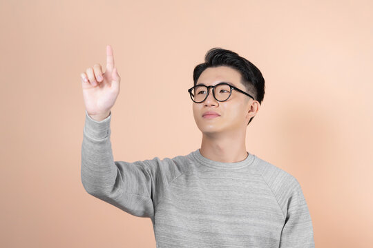 Businessman Touching on the whiteboard, Selective focus on the finger. - Powered by Adobe