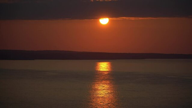 Sunset view of the Black Sea from Sinop mountains. The sun is setting in the Black Sea. Evening sunset on the sea.