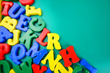 Colorful plastic alphabet letters isolated.