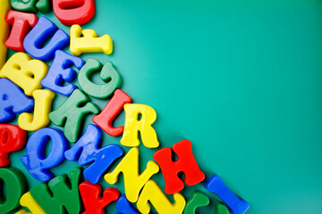 Colorful plastic alphabet letters isolated.