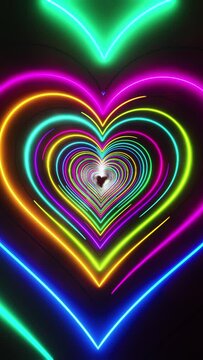 Flying through multicolored hearts painted with light. Vertical looped video