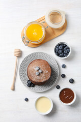Concept of sweet food, chocolate pancakes, top view