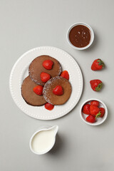 Concept of sweet food, chocolate pancakes, top view