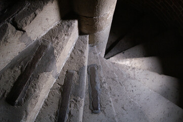 A spiral staircase in the tower of a church
