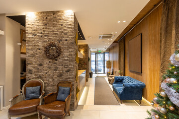 Interior of a hotel lobby with decorated Christmas tree