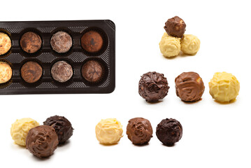 Chocolate candy collection in plastic box.