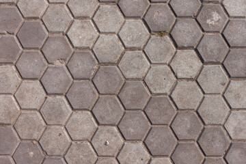 Texture of concrete paving stones in the form of honeycombs. Close-up Fragment. Top view. Background