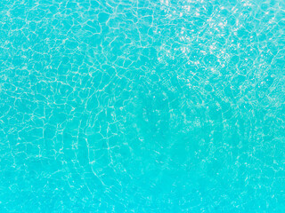 Aerial view of the Overhead view of crystal clear water on beach background