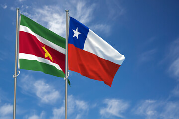 Republic of Suriname and Republic of Chile Flags Over Blue Sky Background. 3D Illustration