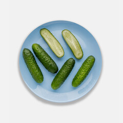pimply fresh cucumbers isolated on white background. natural farm product. Without GMO.